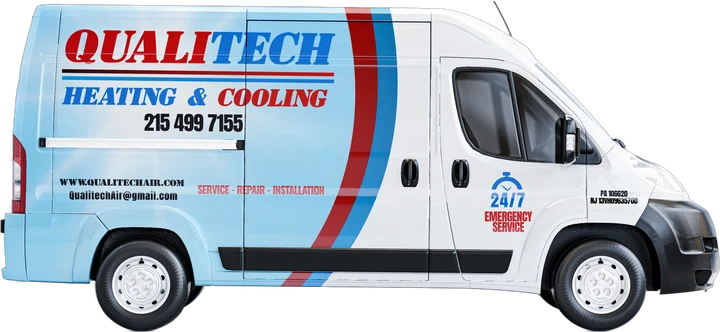 QualiTech Heating & Cooling service van with the company phone number and 24/7 emergency service decal